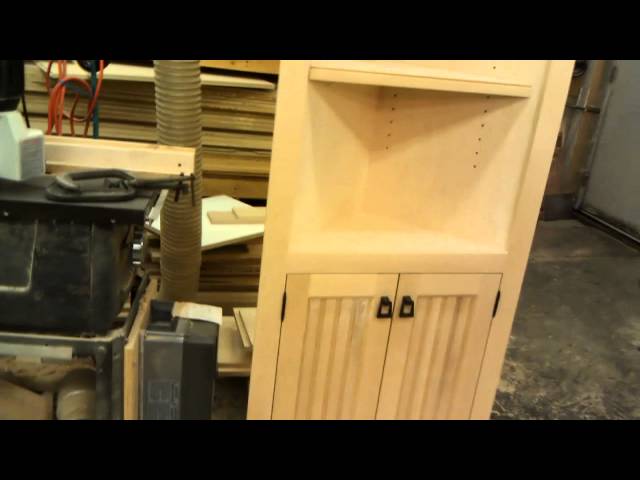 Here is a custom built a corner cabinet that I made that I will be finishing in a deep rich candy apple red stain with a black powder glaze