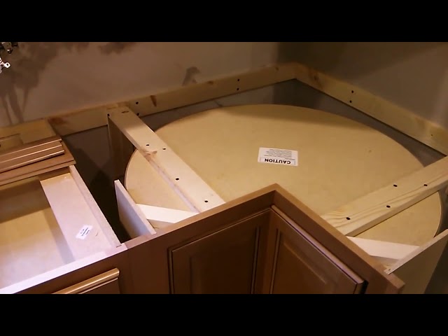 I couldn't find any information on installing a lazy Susan cabinet that had no sides (tube only)