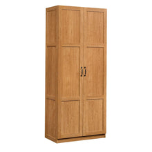 Load image into Gallery viewer, Discover the sauder 419188 storage cabinet l 29 61 x w 16 10 x h 71 10 highland oak finish